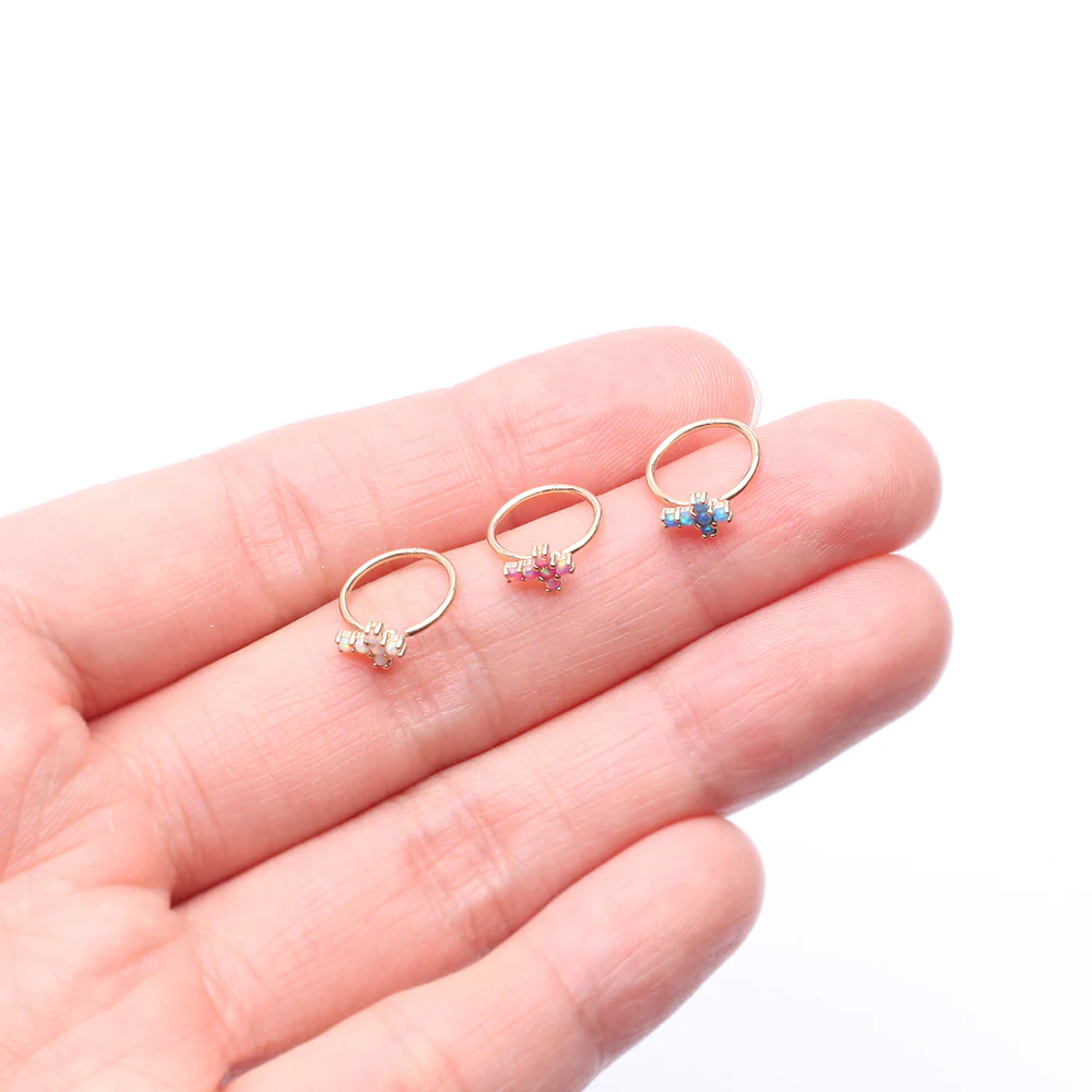 14 Karat Gold Brilliant Fire Opal Cross Bendable Hoop Ring - Image 4