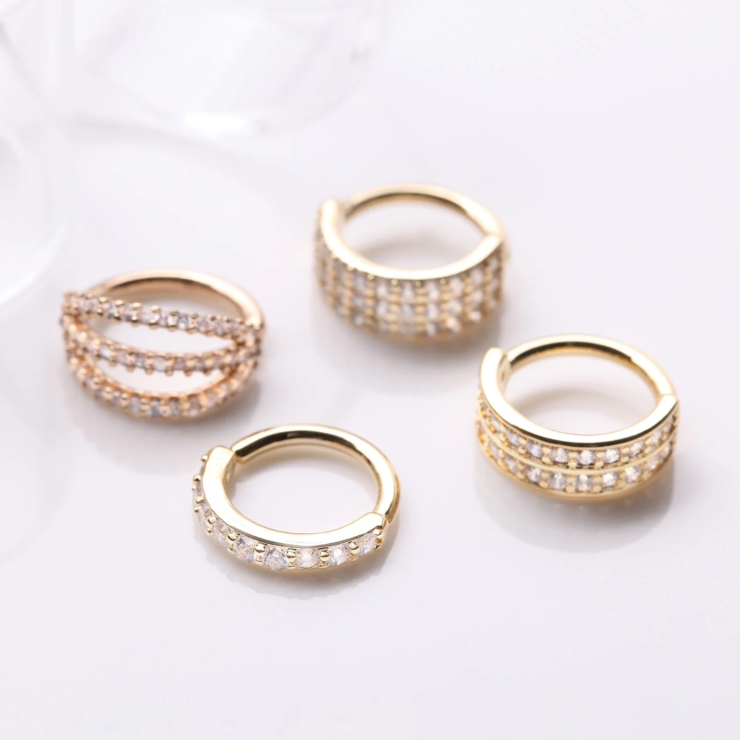 4 Pcs of Assorted Golden Multi-Gem Lined Bendable Hoop Ring Package - Image 2