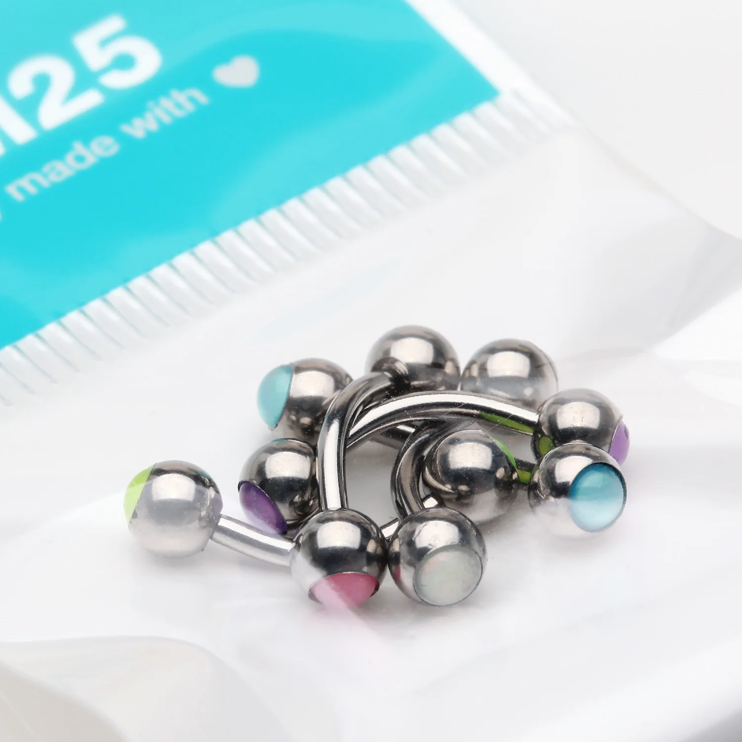 5 Pcs of Assorted Color Iridescent Revo Bezel Set Curved Barbells Package - Image 2