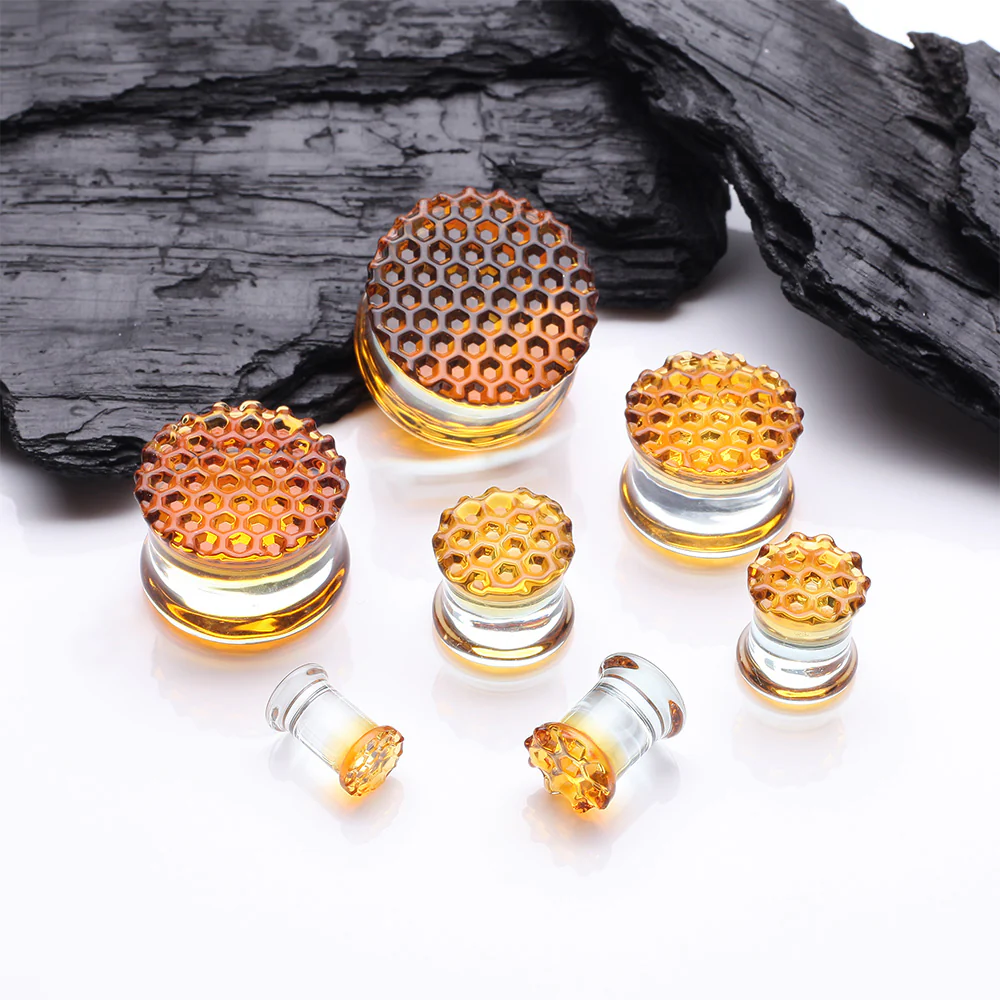 A Pair of Amber Honeycomb Glass Double Flared Plug - Image 3
