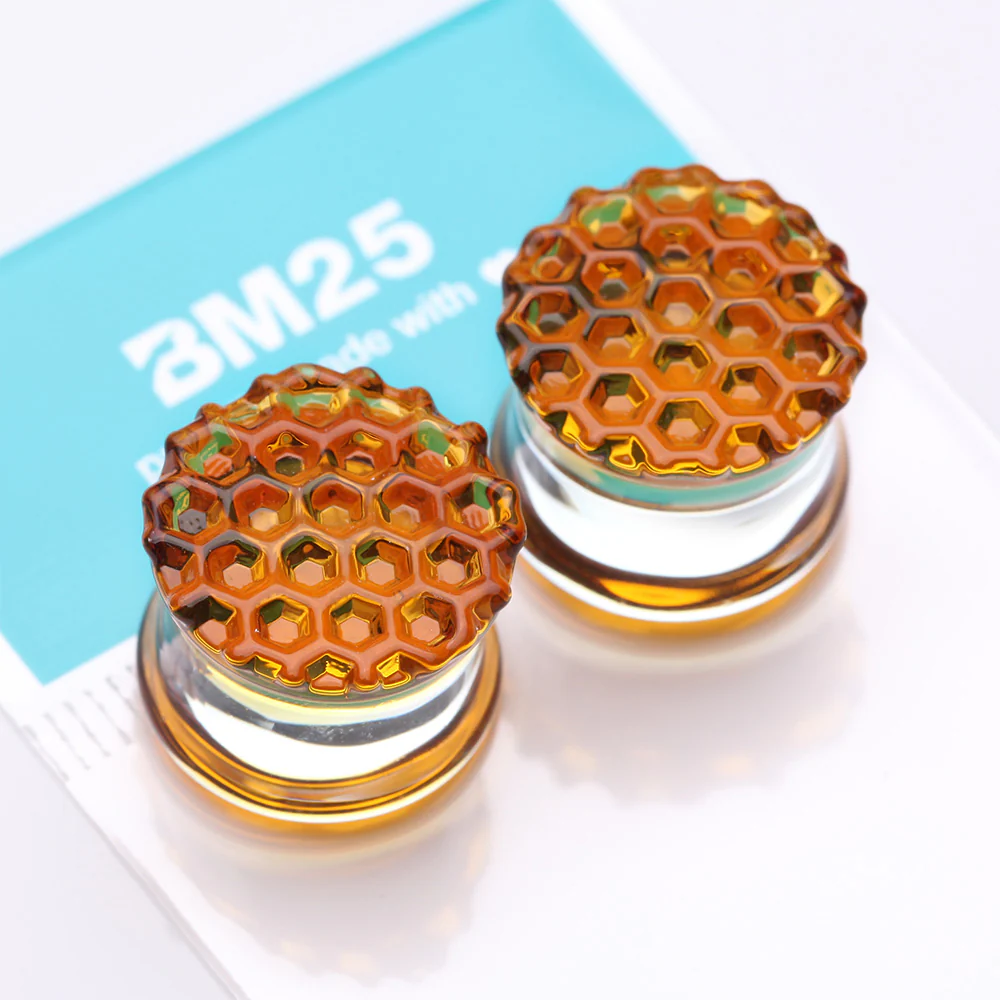 A Pair of Amber Honeycomb Glass Double Flared Plug - Image 4