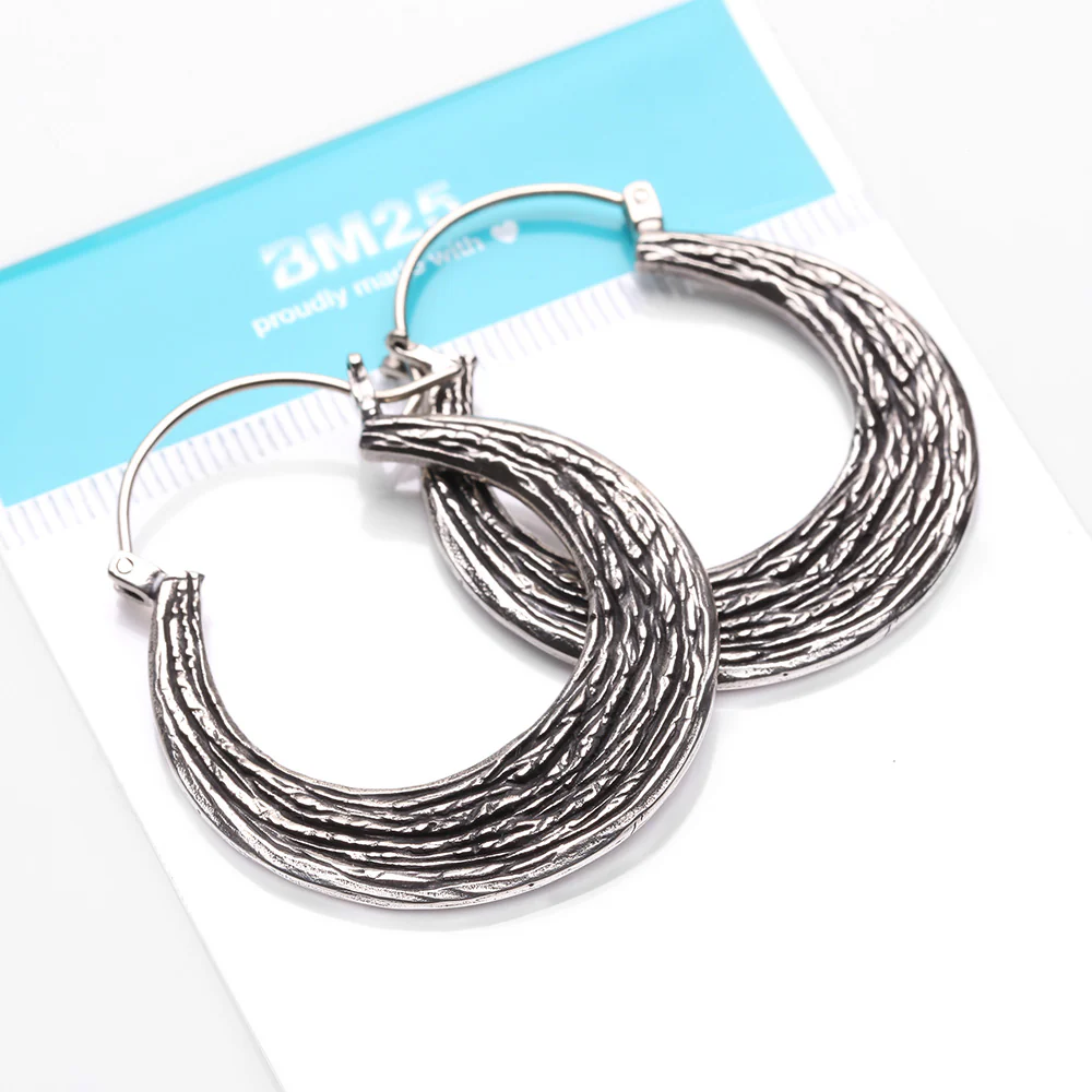 A Pair of Ancient Bali Ornate White Brass Loop Plug Hoop Earring - Image 5