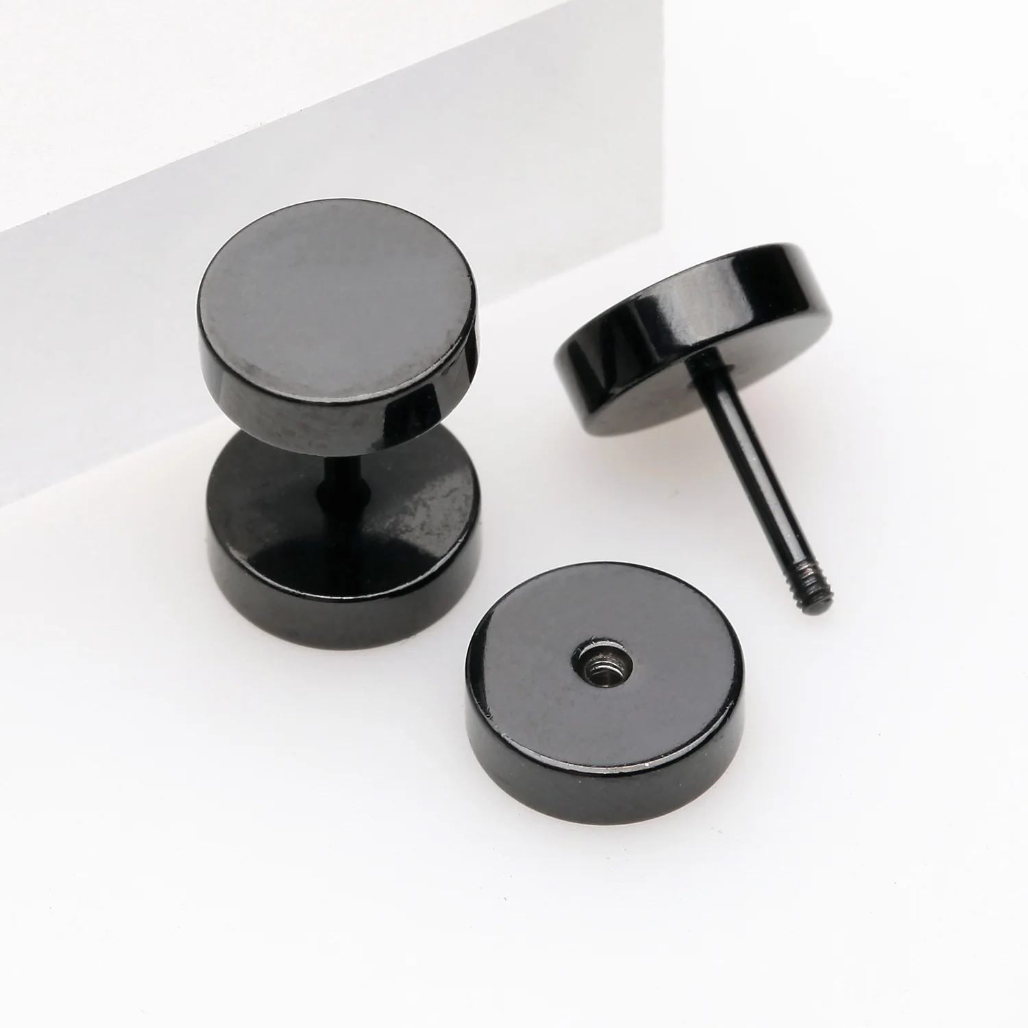 A Pair of Black Metal Steel Fake Plug - Image 2