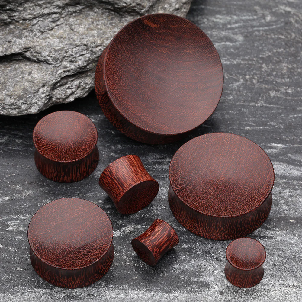 A Pair of Concave Dark Tamarind Wood Double Flared Plug - Image 3