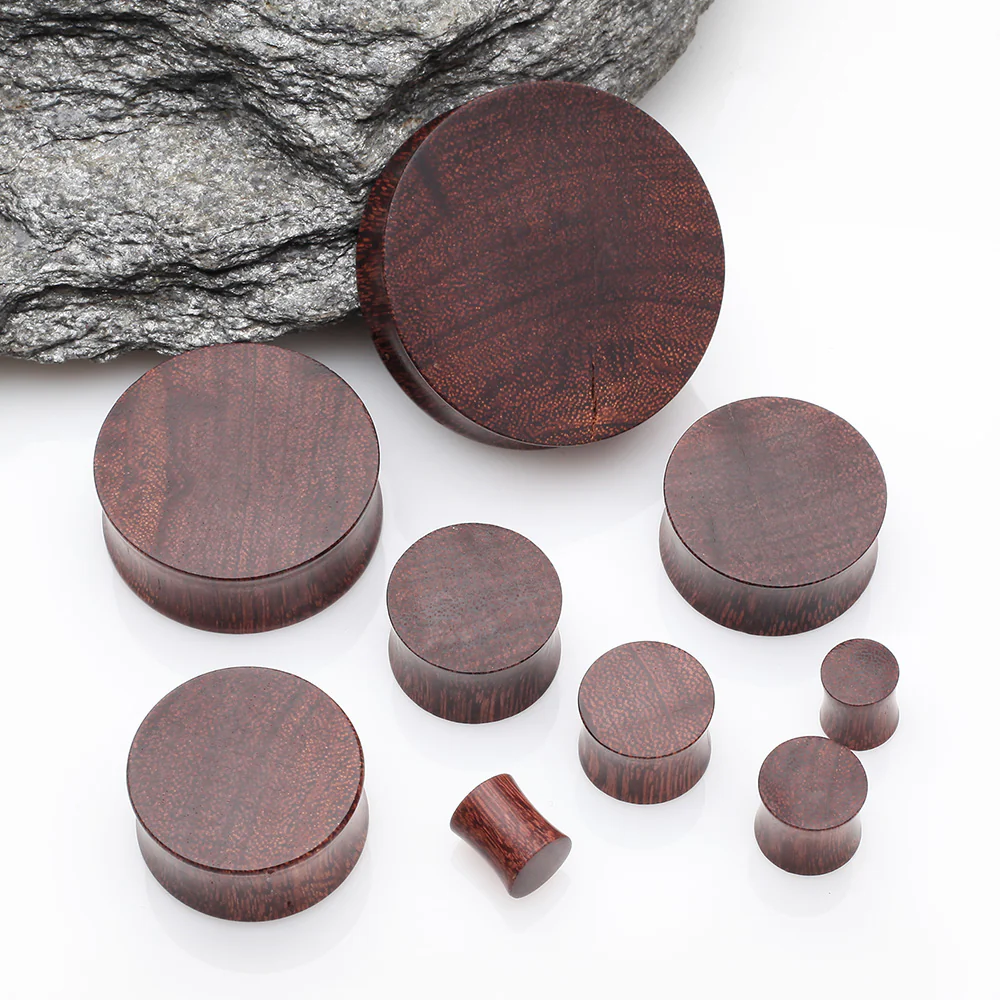 A Pair of Dark Tamarind Wood Double Flared Plug - Image 3
