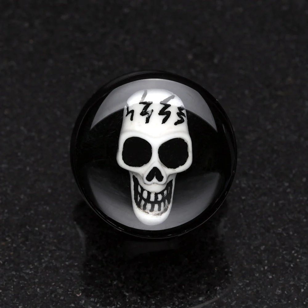 A Pair of Electro 3D Skull Resin Inlay Double Flared Ear Gauge Plug - Image 3