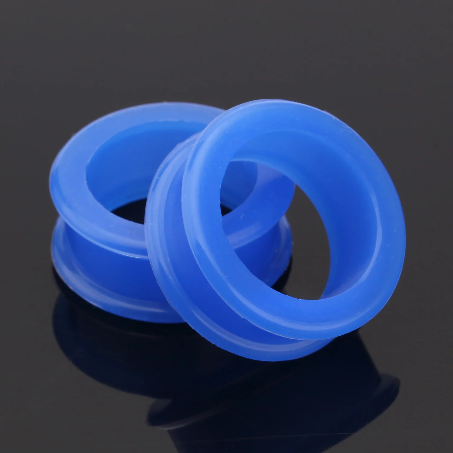 A Pair of Flexible Silicone Double Flared Ear Gauge Tunnel Plug - Image 2