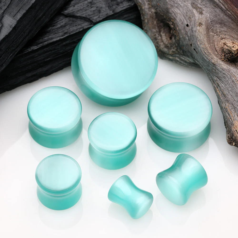 A Pair of Mint Cat-Eye Stone Double Flared Ear Gauge Plug - Image 3