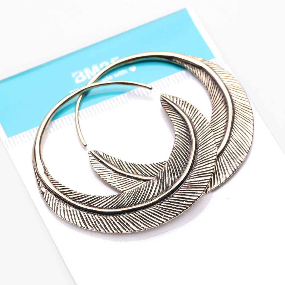 A Pair of Mystic Feather Loop Golden Brass Plug Hoop Earring - Image 5