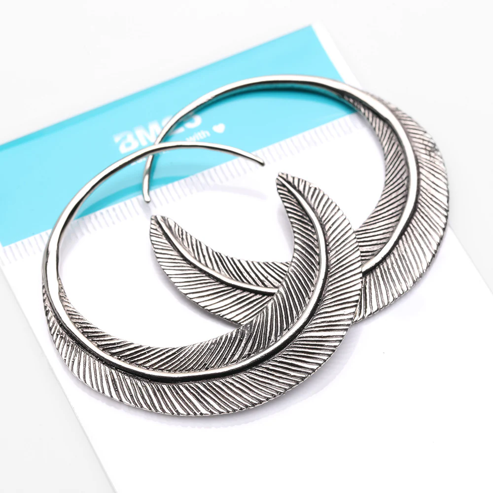 A Pair of Mystic Feather Loop White Brass Plug Hoop Earring - Image 5
