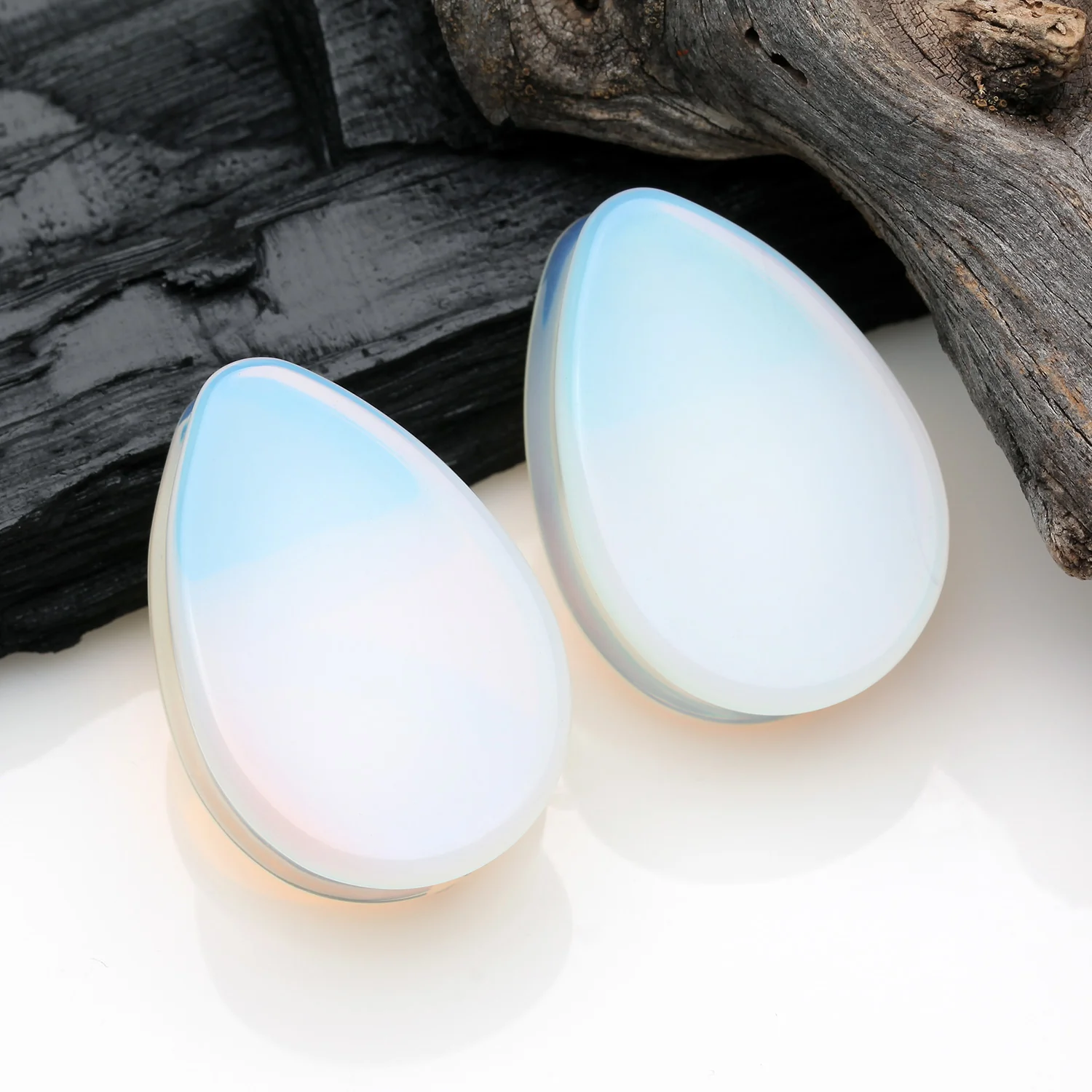 A Pair of Opalite Stone Teardrop Double Flared Ear Gauge Plug - Image 2