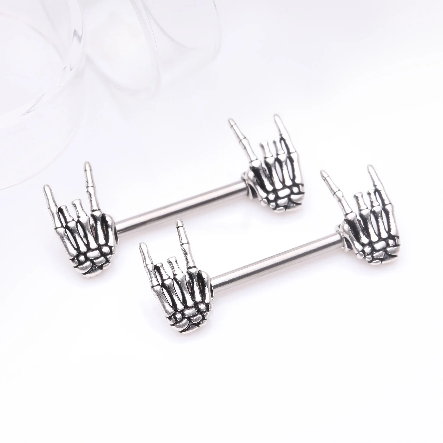 A Pair of Rock On Skeleton Hands Steel Nipple Barbell - Image 2