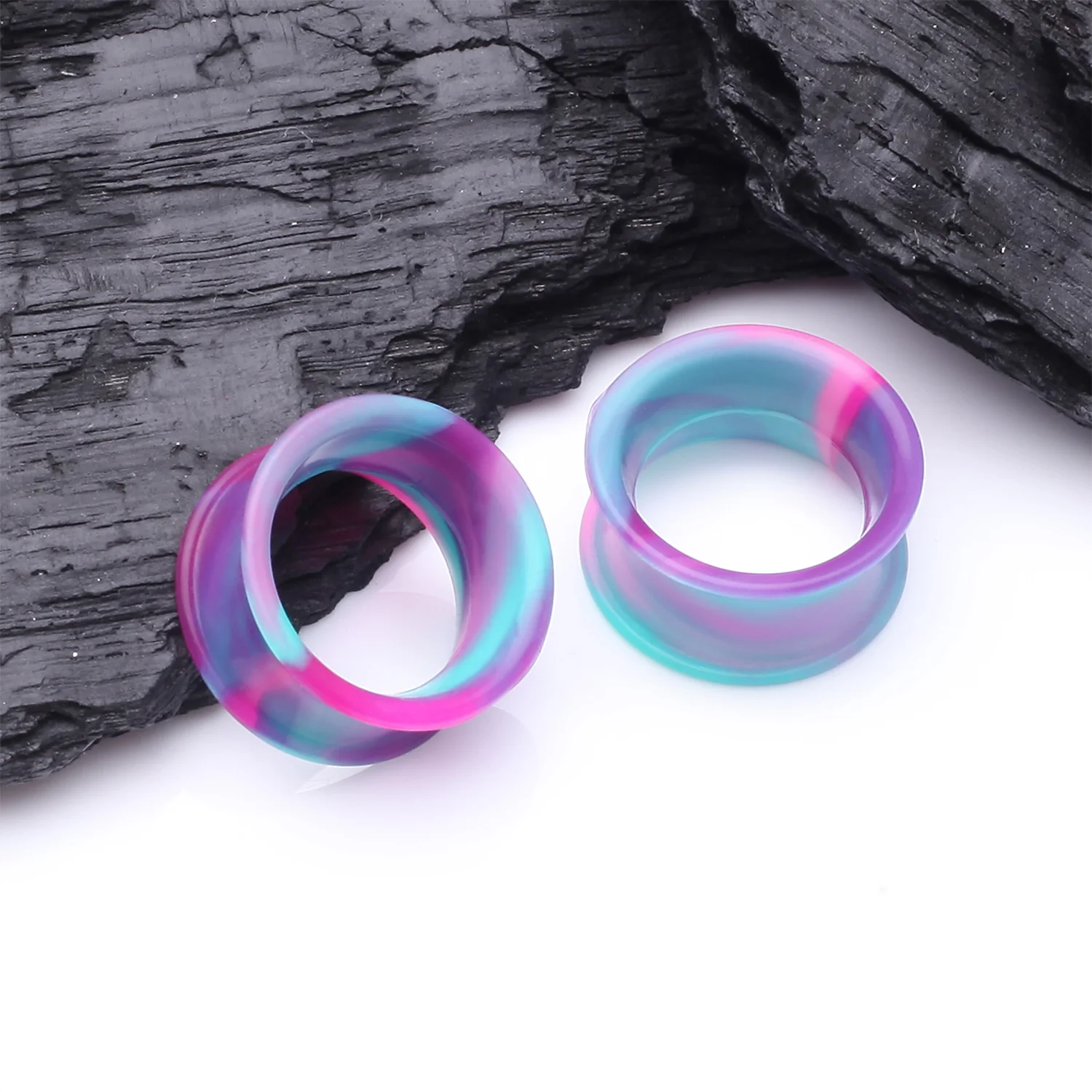 A Pair of Ultra Flexible Cosmic Flair Camo Silicone Double Flared Tunnel Plug - Image 2