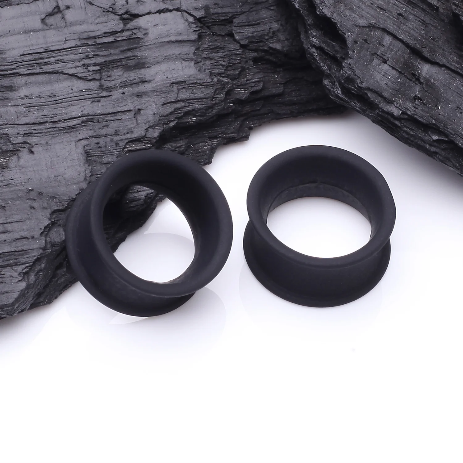 A Pair of Ultra Flexible Flat Black Silicone Double Flared Tunnel Plug - Image 2