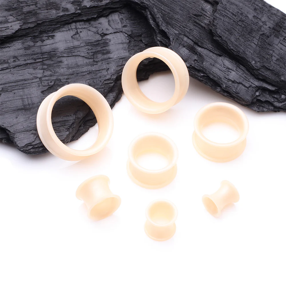 A Pair of Ultra Flexible Peach Silicone Double Flared Tunnel Plug - Image 3