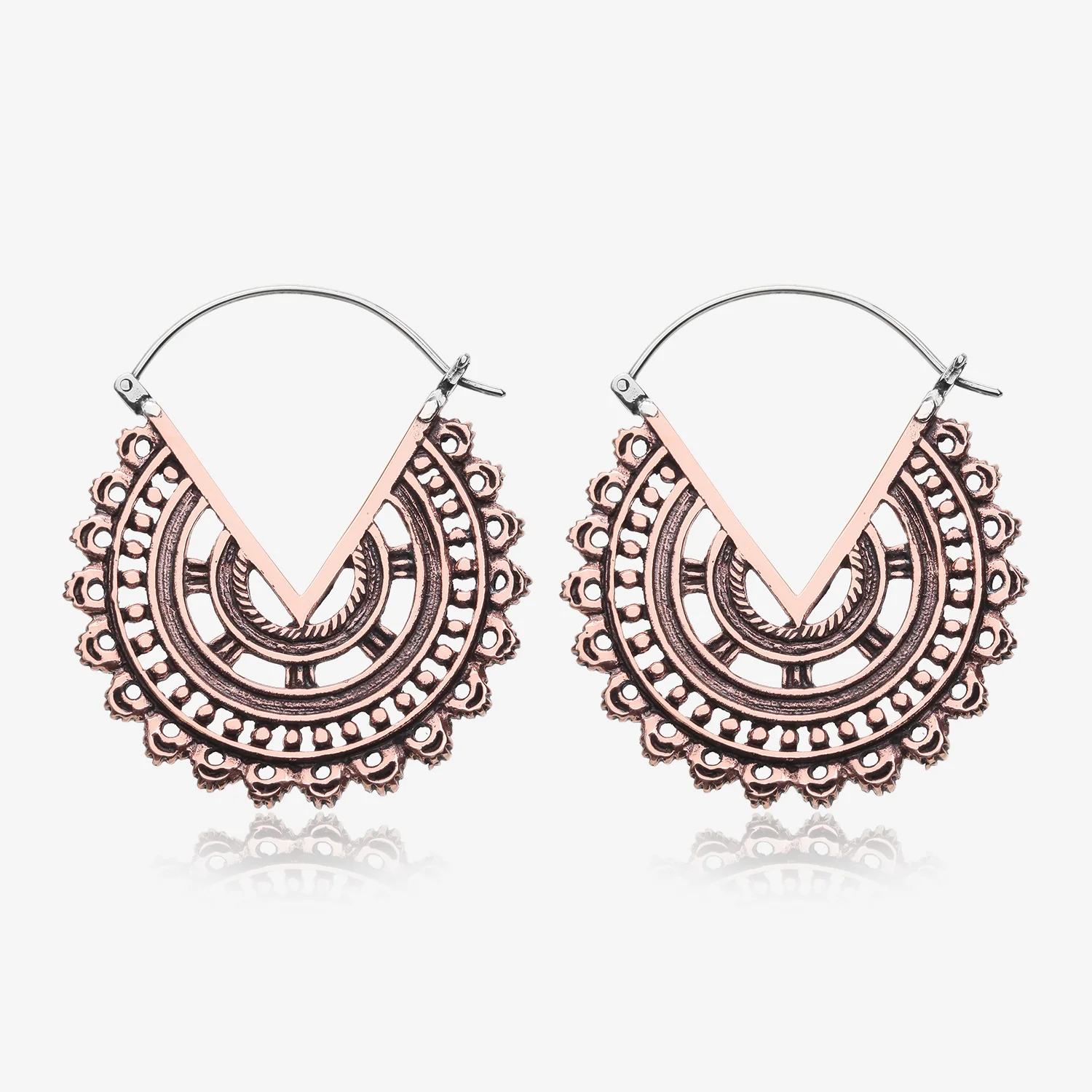 A Pair of Vintage Bali Warrior Emblem Copper Plug Hoop Earring