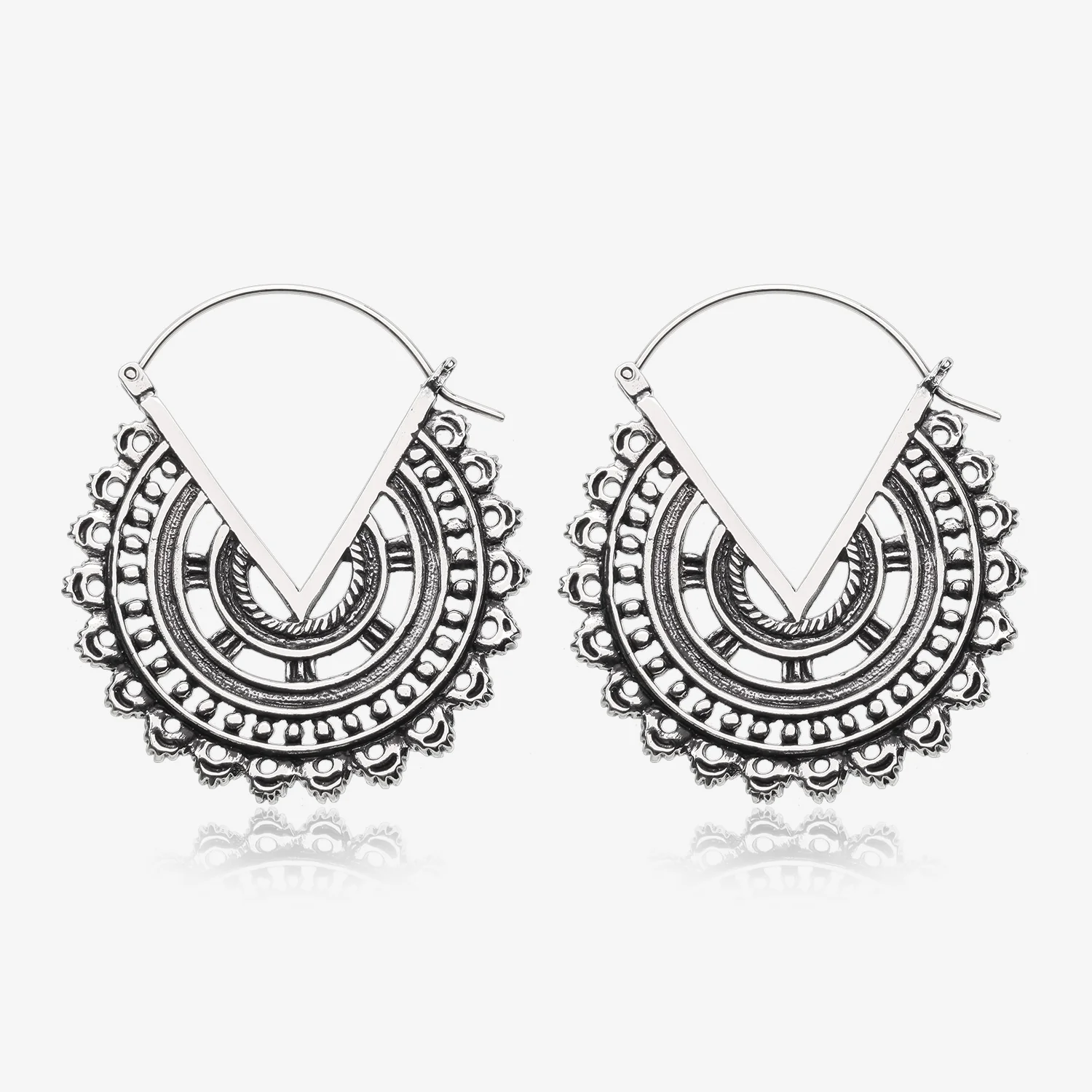 A Pair of Vintage Bali Warrior Emblem White Brass Plug Hoop Earring