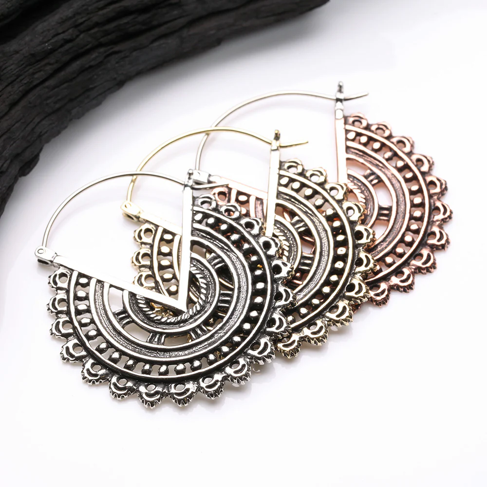 A Pair of Vintage Bali Warrior Emblem White Brass Plug Hoop Earring - Image 4