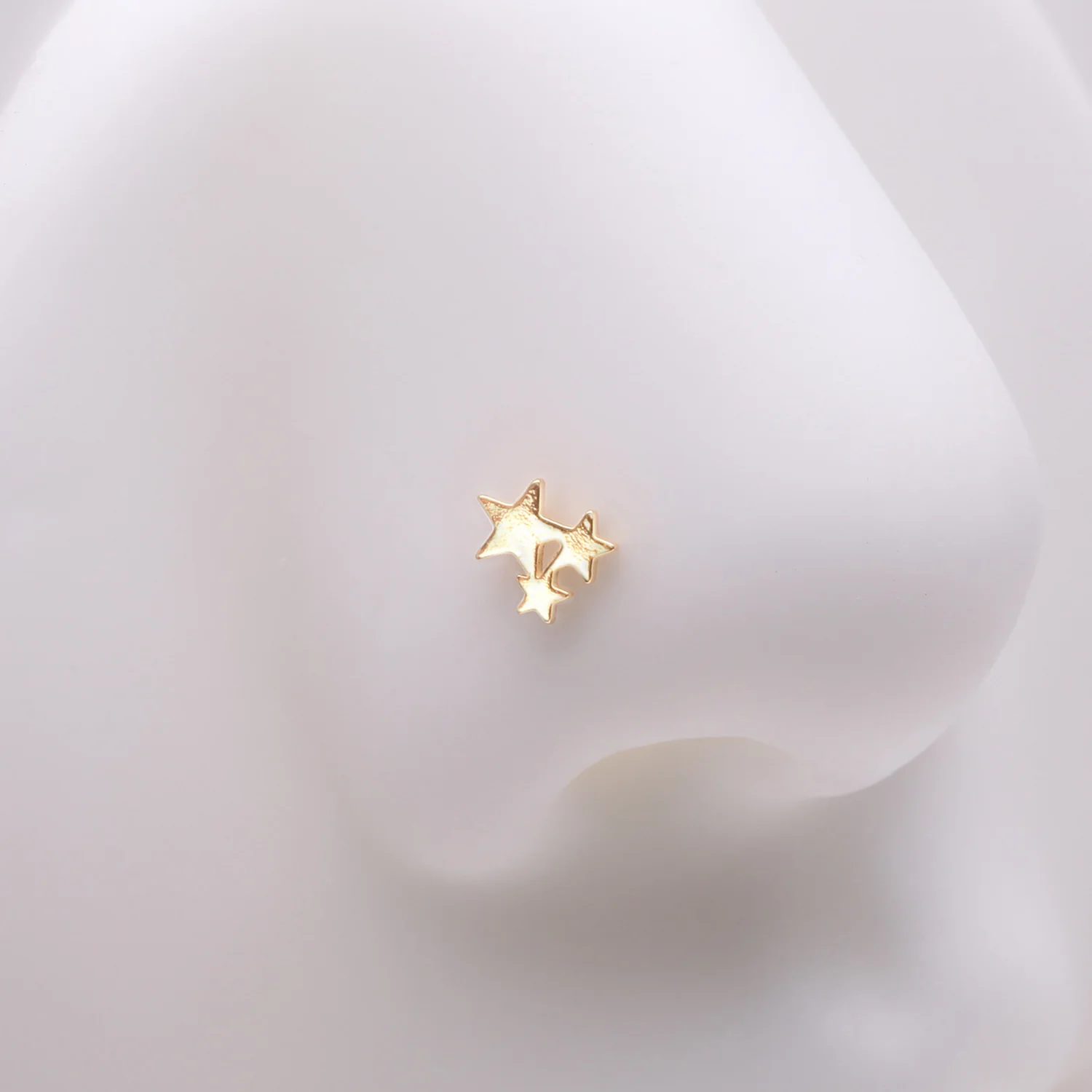 Golden Triple Star Icon Nose Stud Ring - Image 2